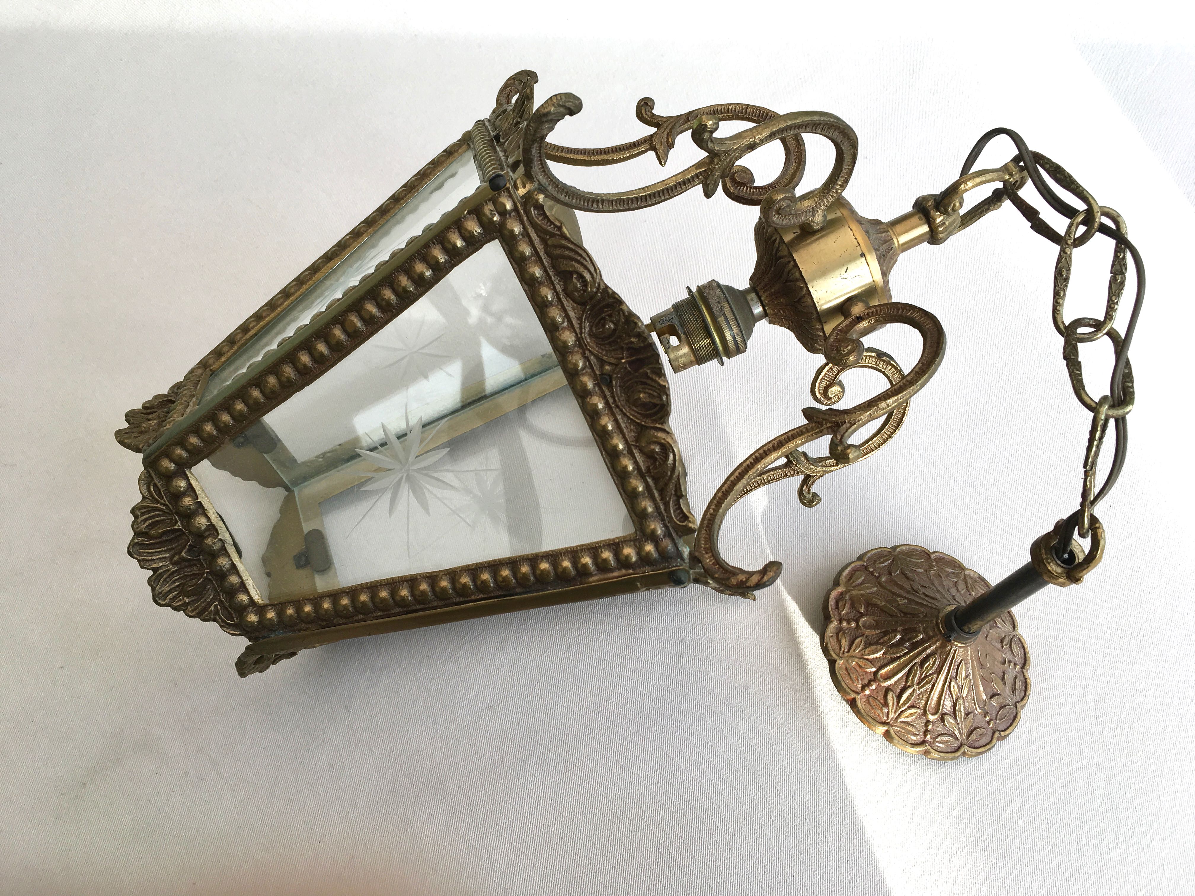 Hanging brass lantern and engraved glass