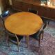 Table ronde rallonge intégrée vintage