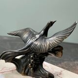 Pair of marble bookends with bronze birds
