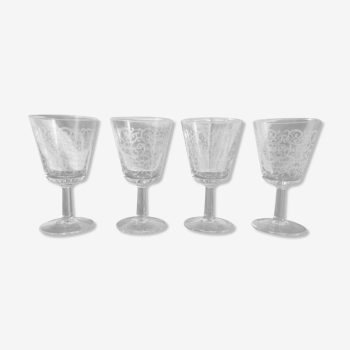 4 small engraved foot glasses