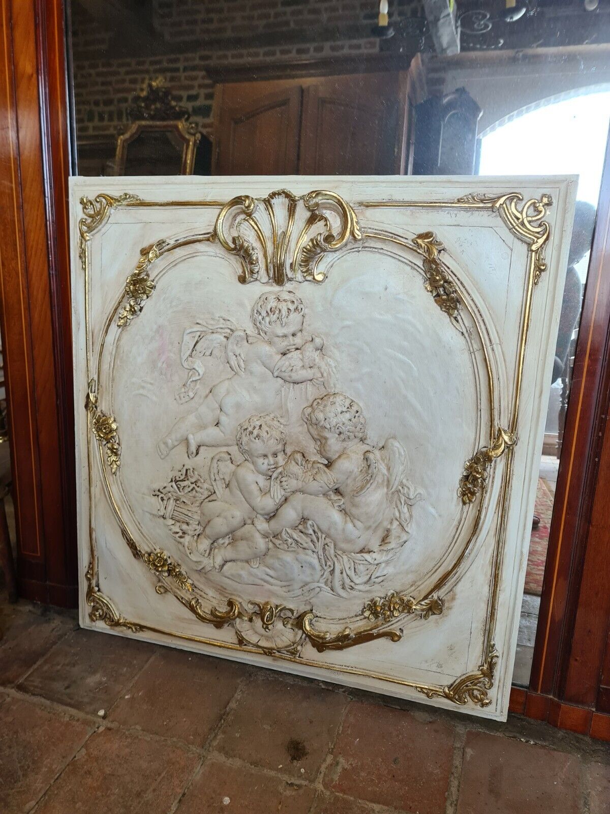 Decorative panel with stucco angels