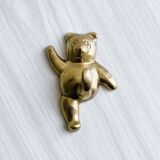 Towel rack - metal bear coat rack.