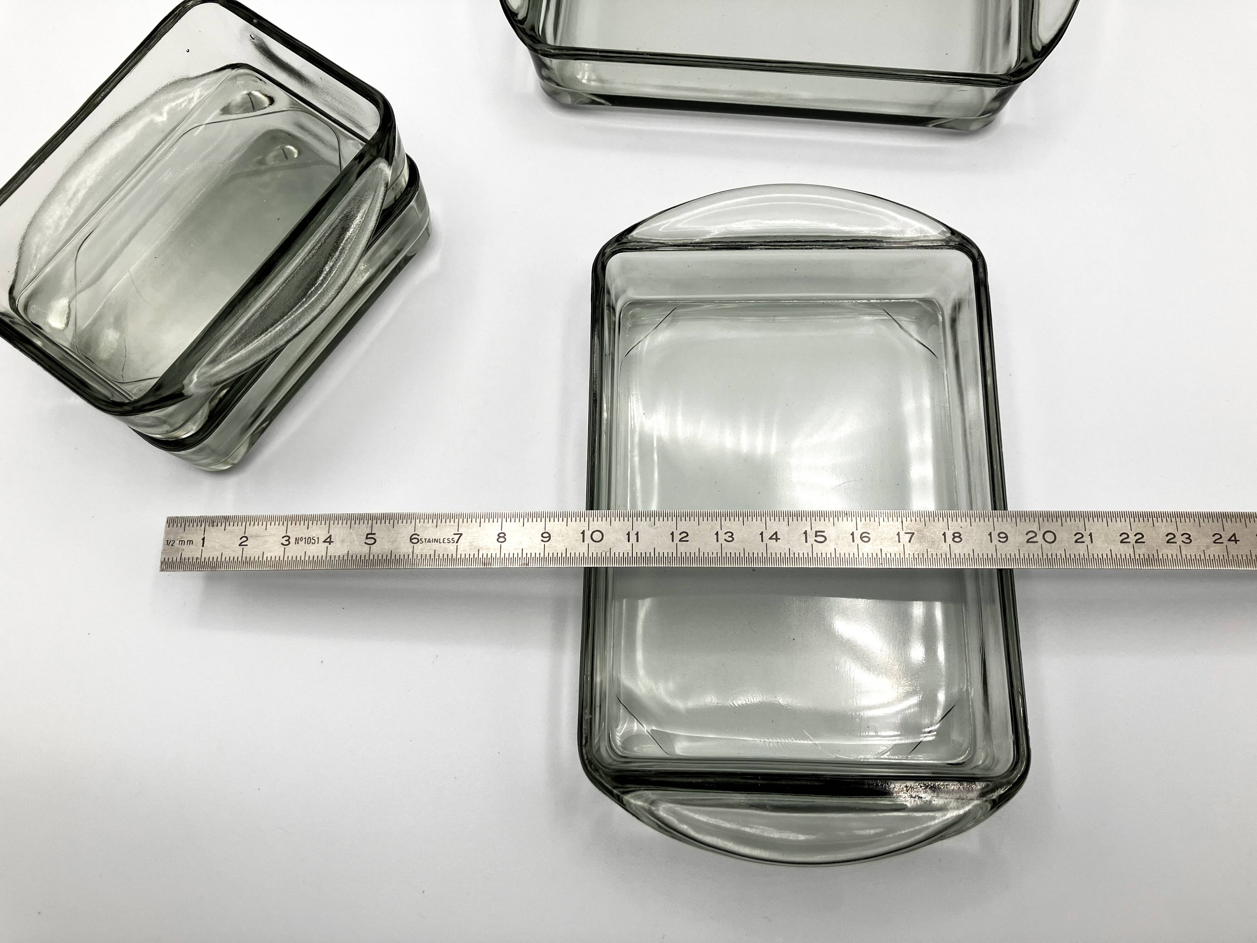 Teak tray and its 4 stackable glass dishes • Denmark • 1960