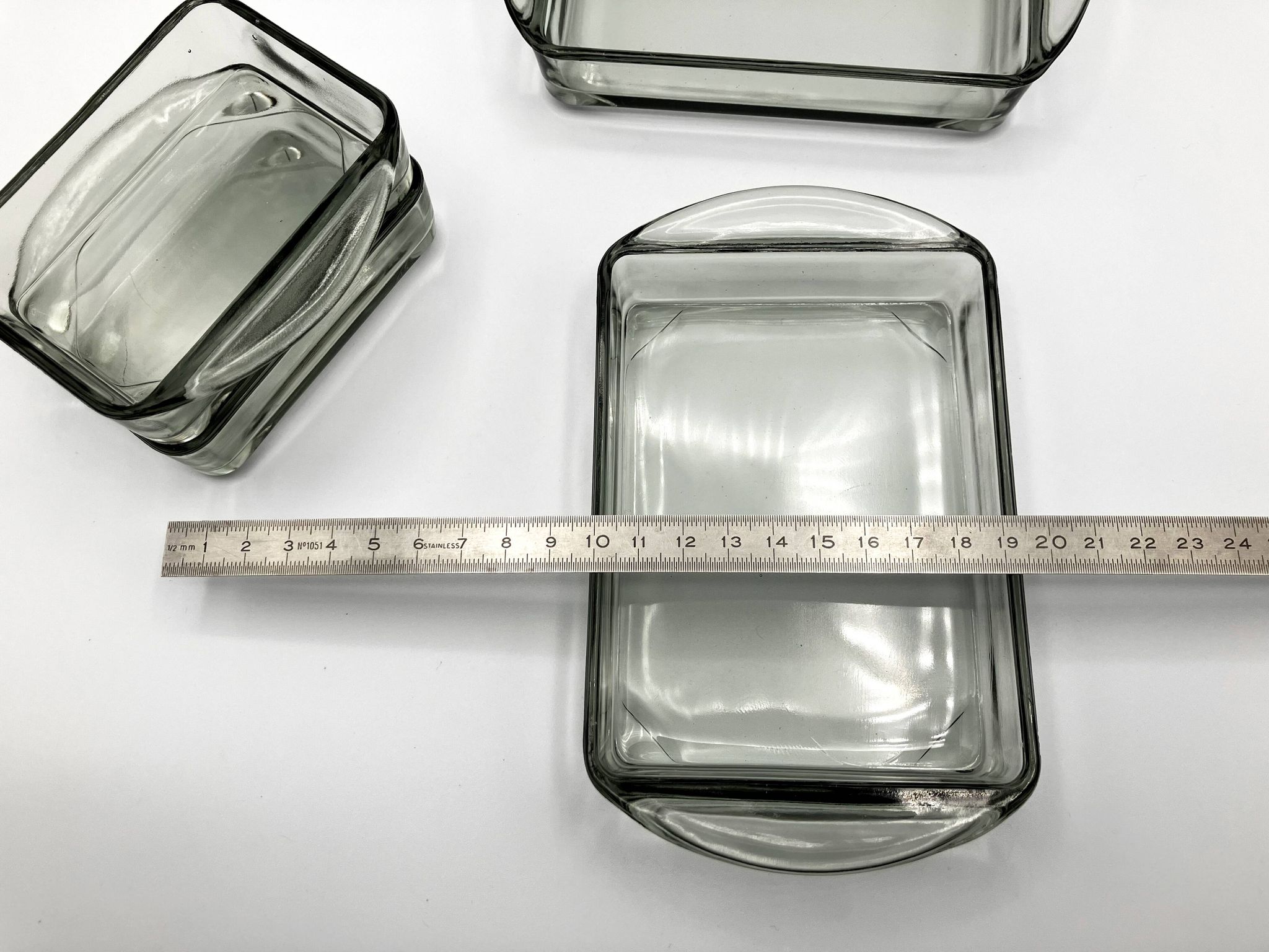 Teak tray and its 4 stackable glass dishes • Denmark • 1960