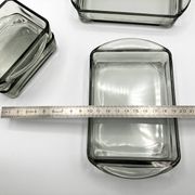 Teak tray and its 4 stackable glass dishes • Denmark • 1960
