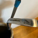 Golf bag filled with 5 vintage clubs