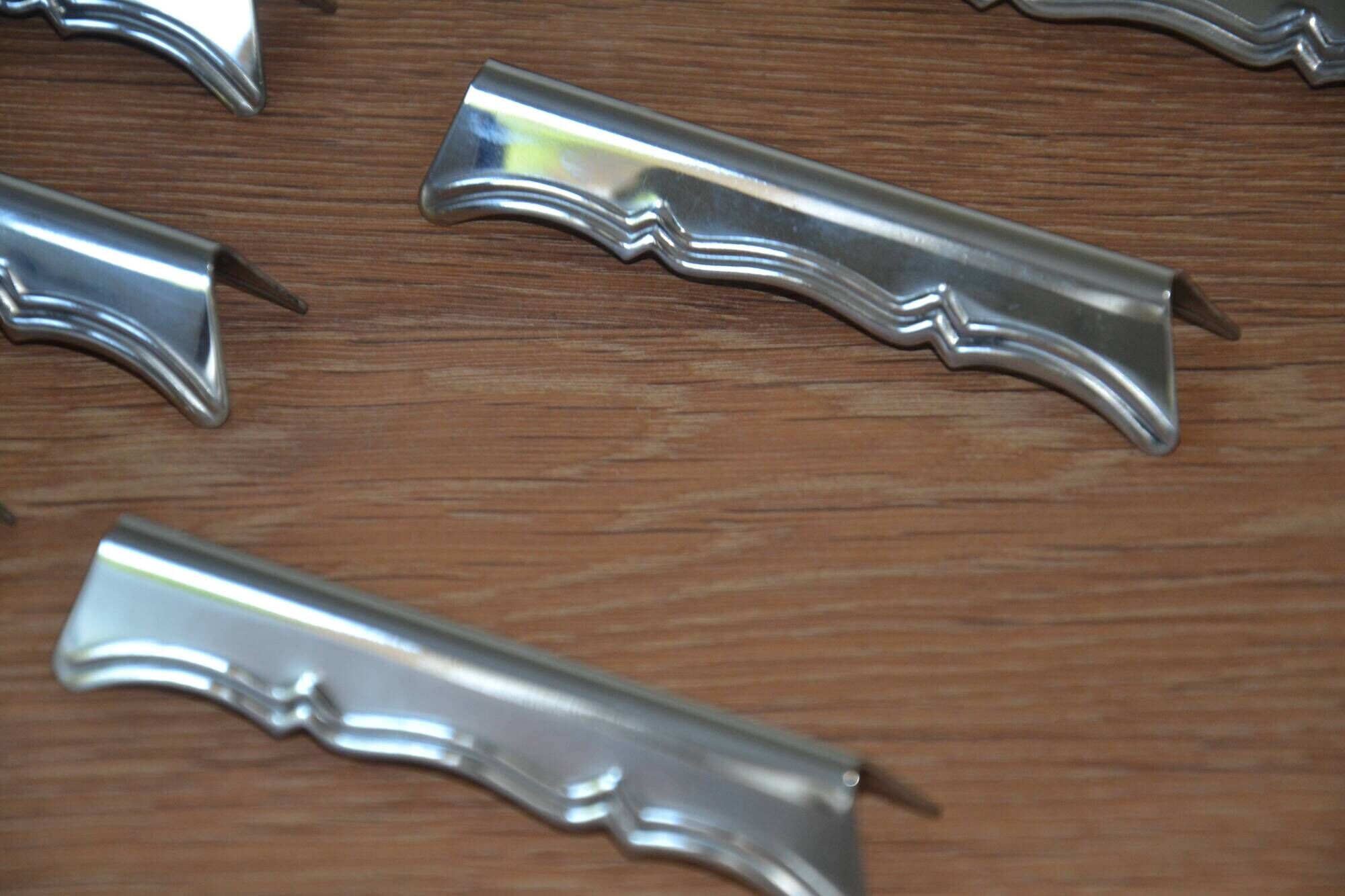 12 silver-plated knife rests