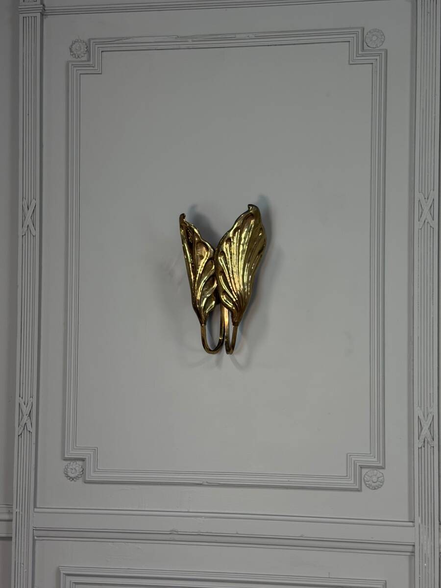 Set of four gilt brass wall lights, Tommaso Barbi, circa 1960.