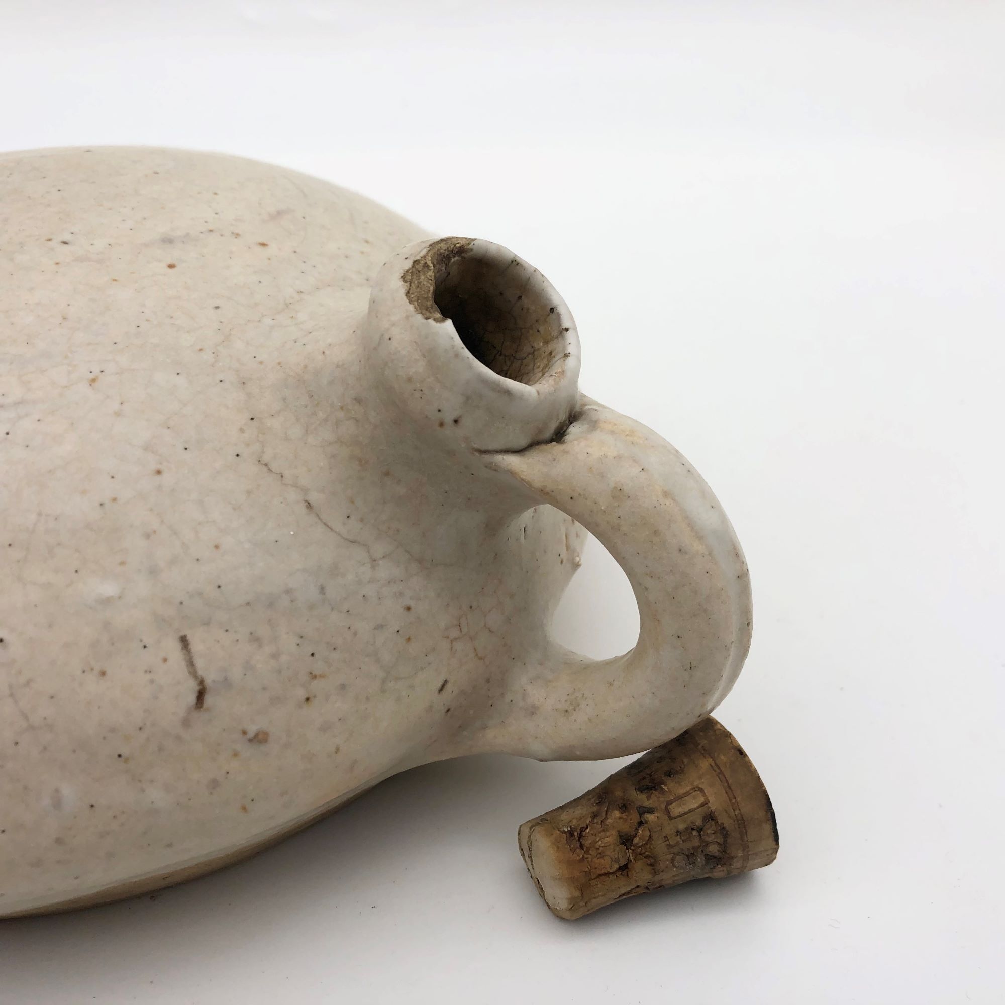 Old round sandstone hot water bottle