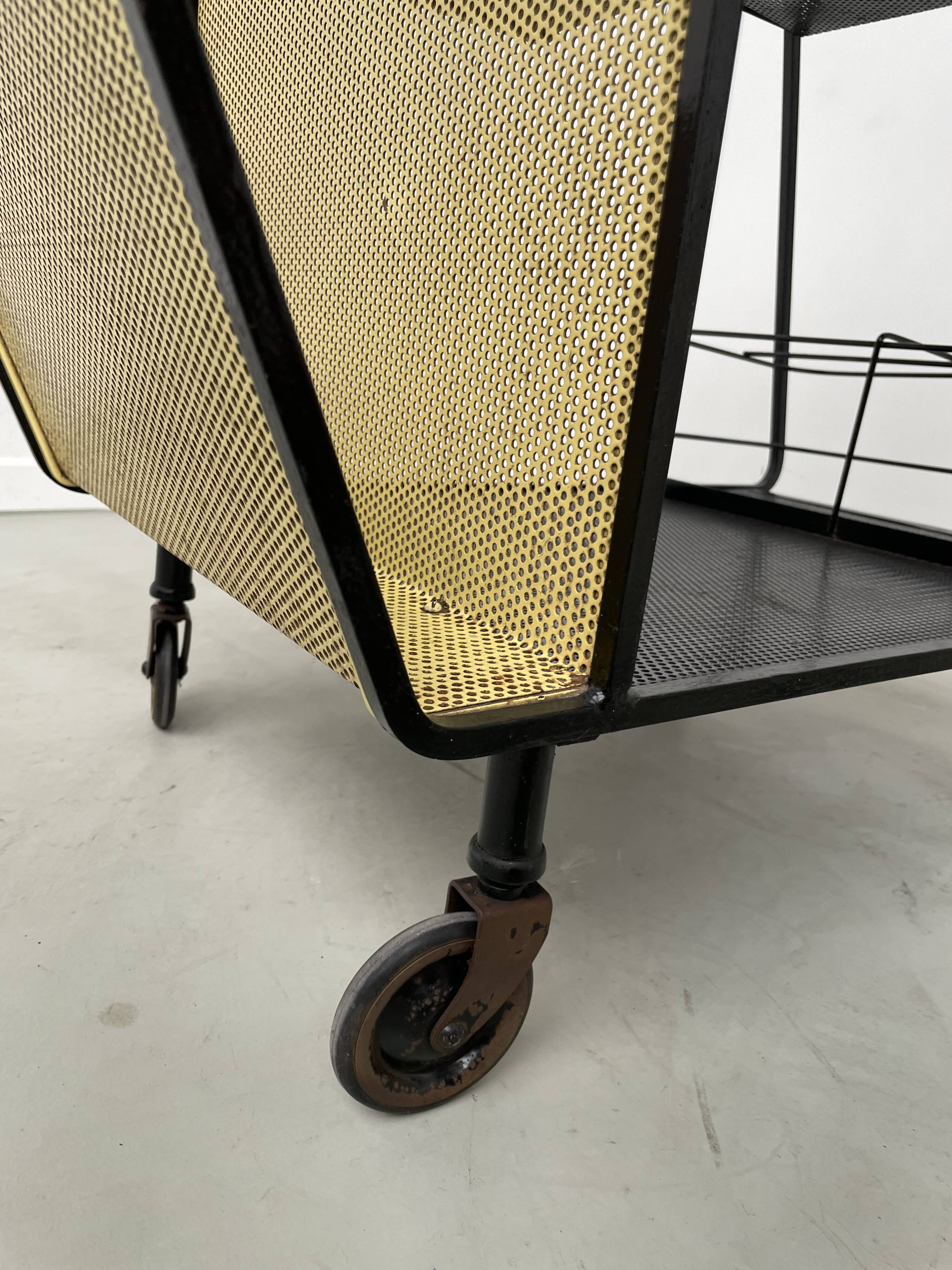 Perforated metal serving trolley in the Mathieu Matégot style