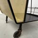 Perforated metal serving trolley in the Mathieu Matégot style