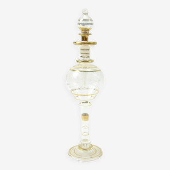 Chiseled perfume bottle or vial