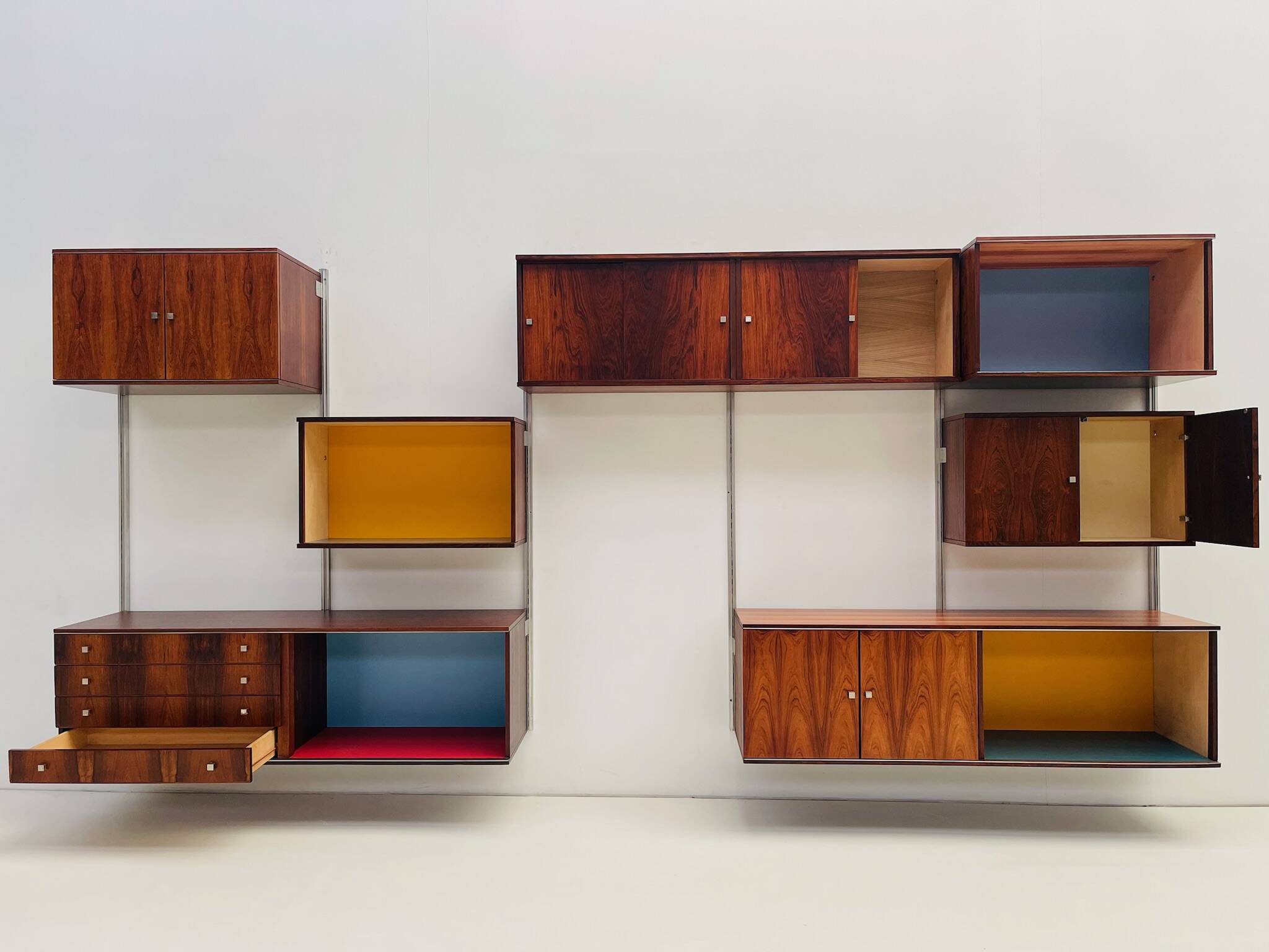 Large colorful wall unit in luxury wood