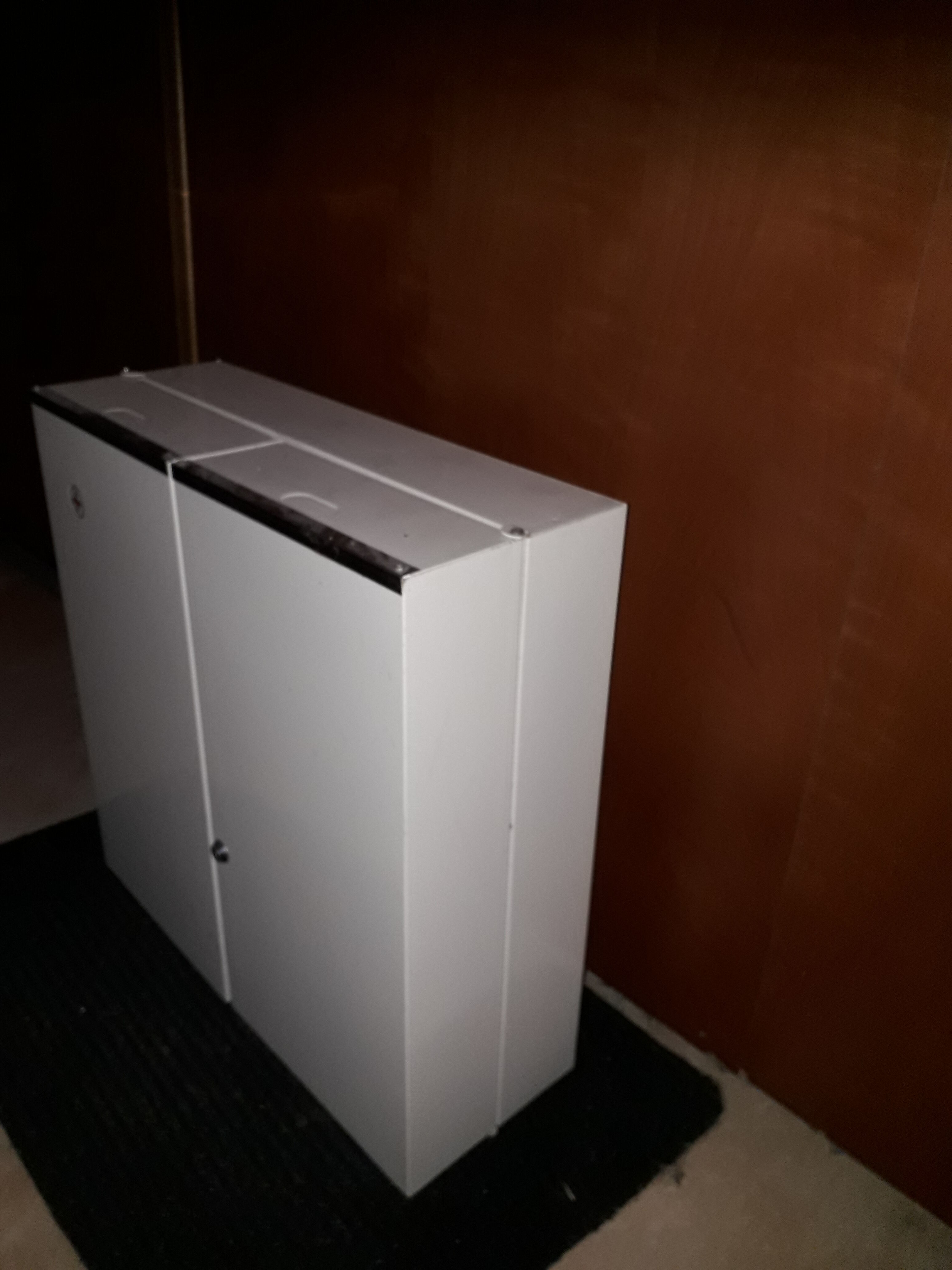 White lacquered metal medicine cabinet