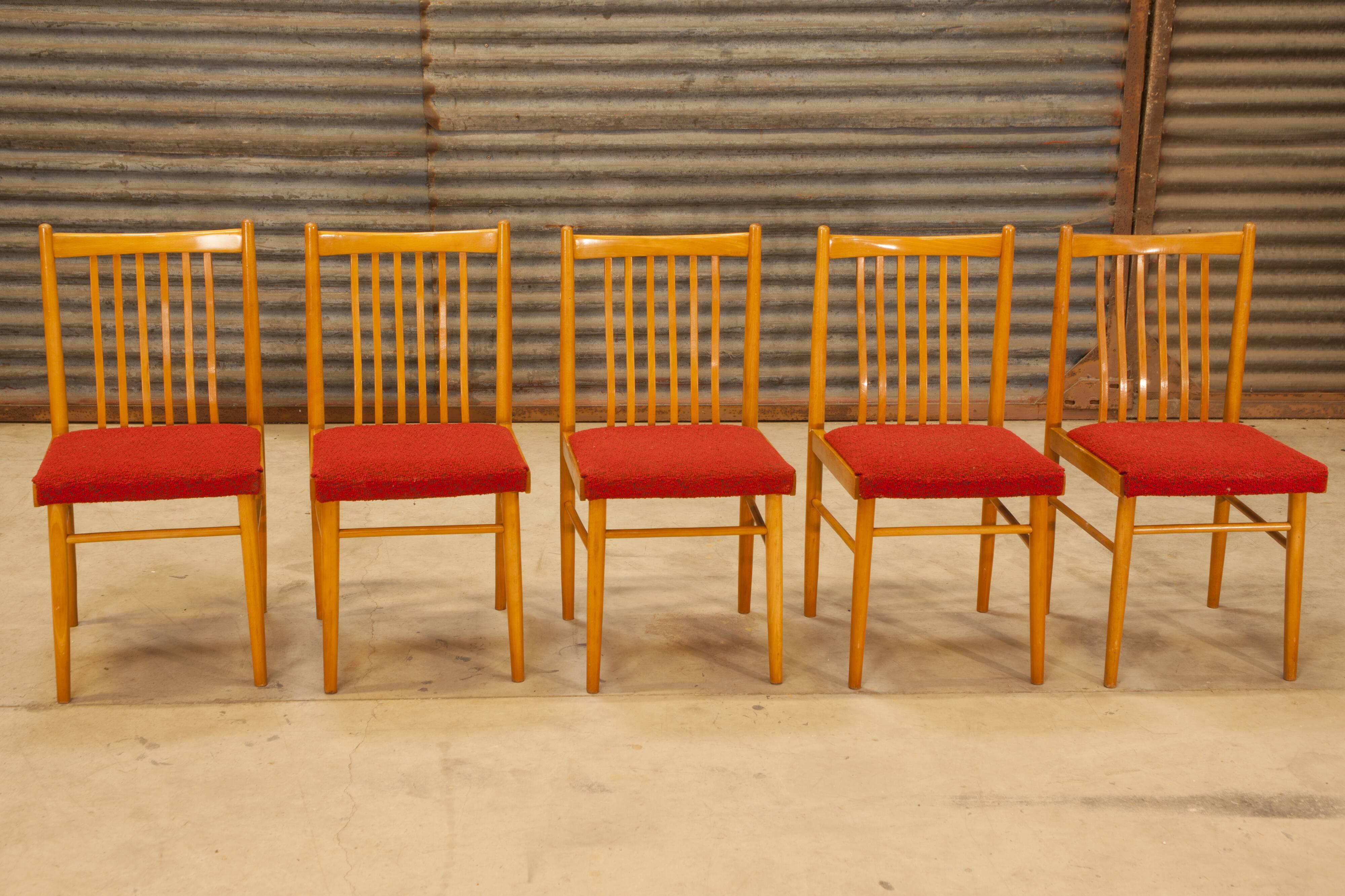 Set of 5 wooden chairs and red fabric