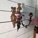 Wall light with 3 flames in bronze and porcelain in Louis XVI style.