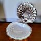Shell-shaped butter dish in stainless steel