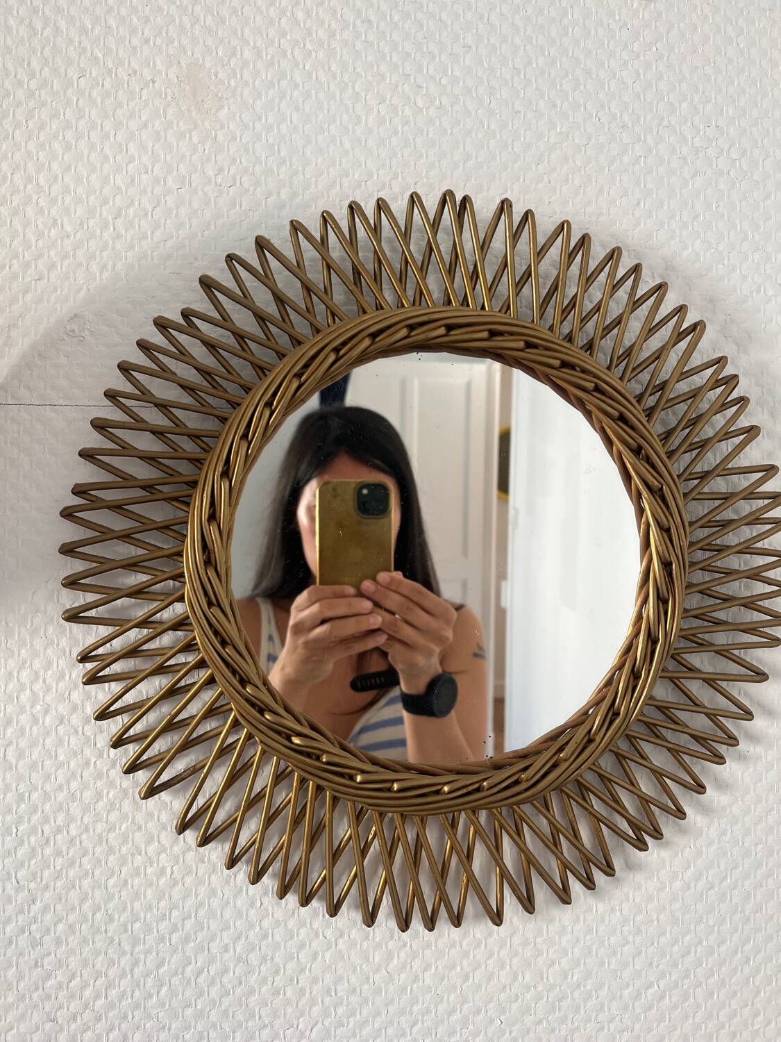 Vintage gold rattan sun mirror