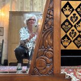 Art deco mirror in carved walnut