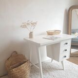 White desk with compass feet circa 1960