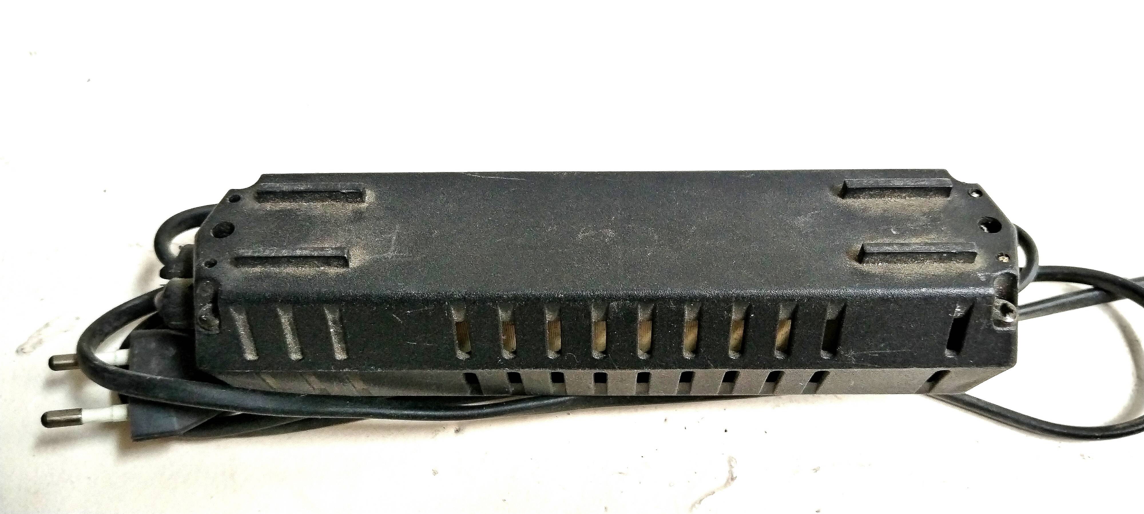 Black lacquered perforated metal table lamp with neon lighting - vintage from the 80s / 90s