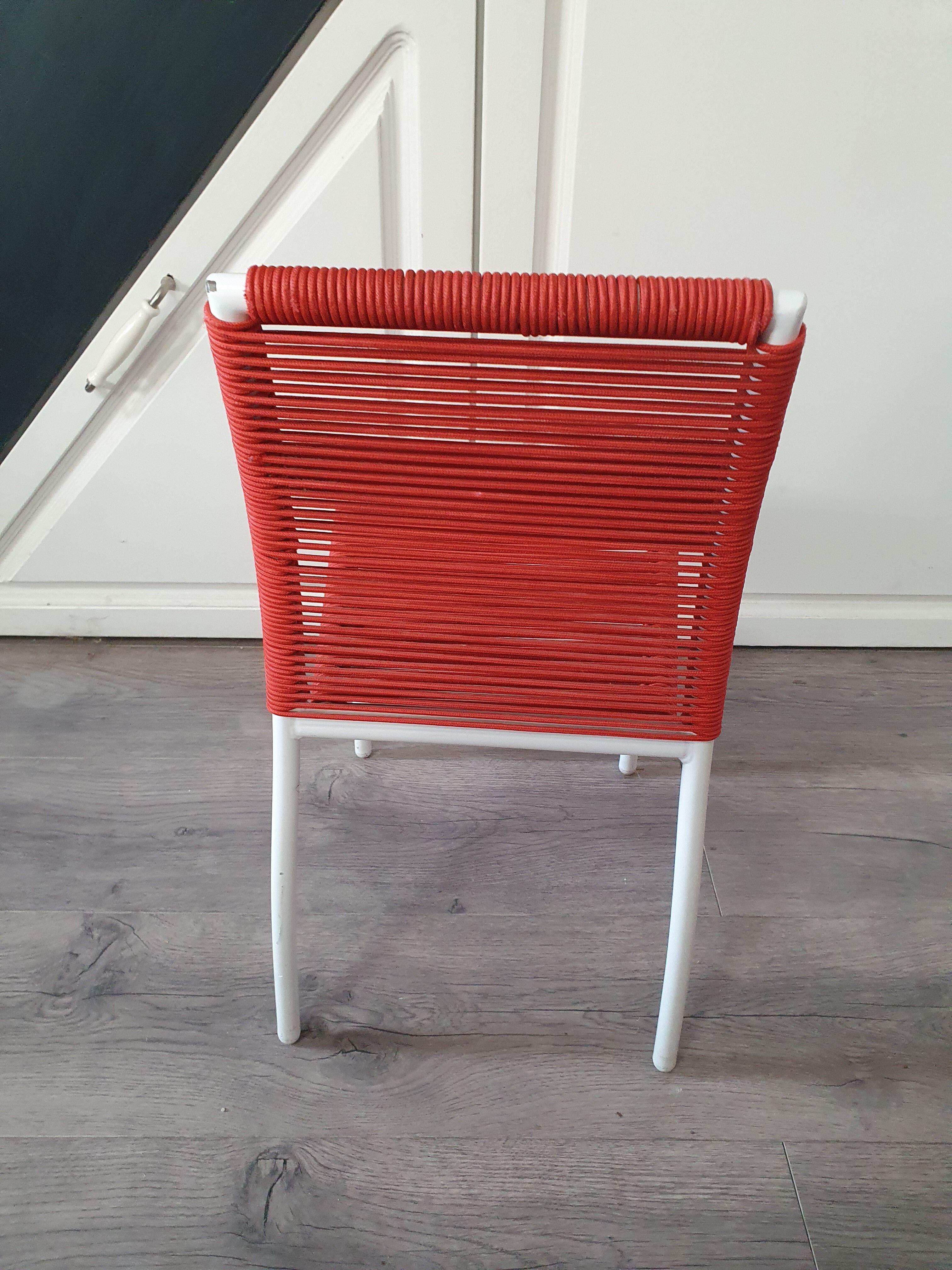 Vintage children's chair in white matel (some splinters of paint) with red scoubidou rope year 70