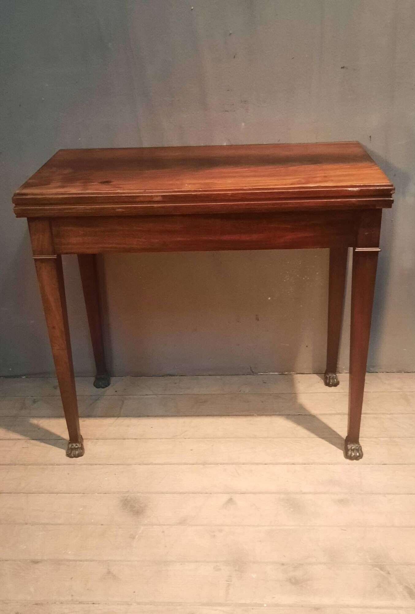 Rectangular console that transforms into a game table.