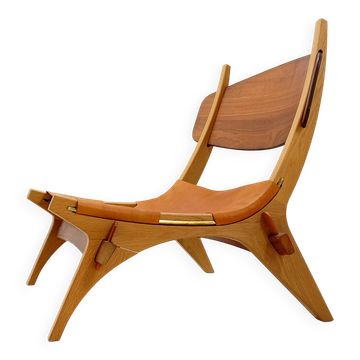 Vintage Scandinavian-style lounge chair in wood and leather
