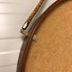 Pizzetti cognac leather mirror, 1950s, Italy