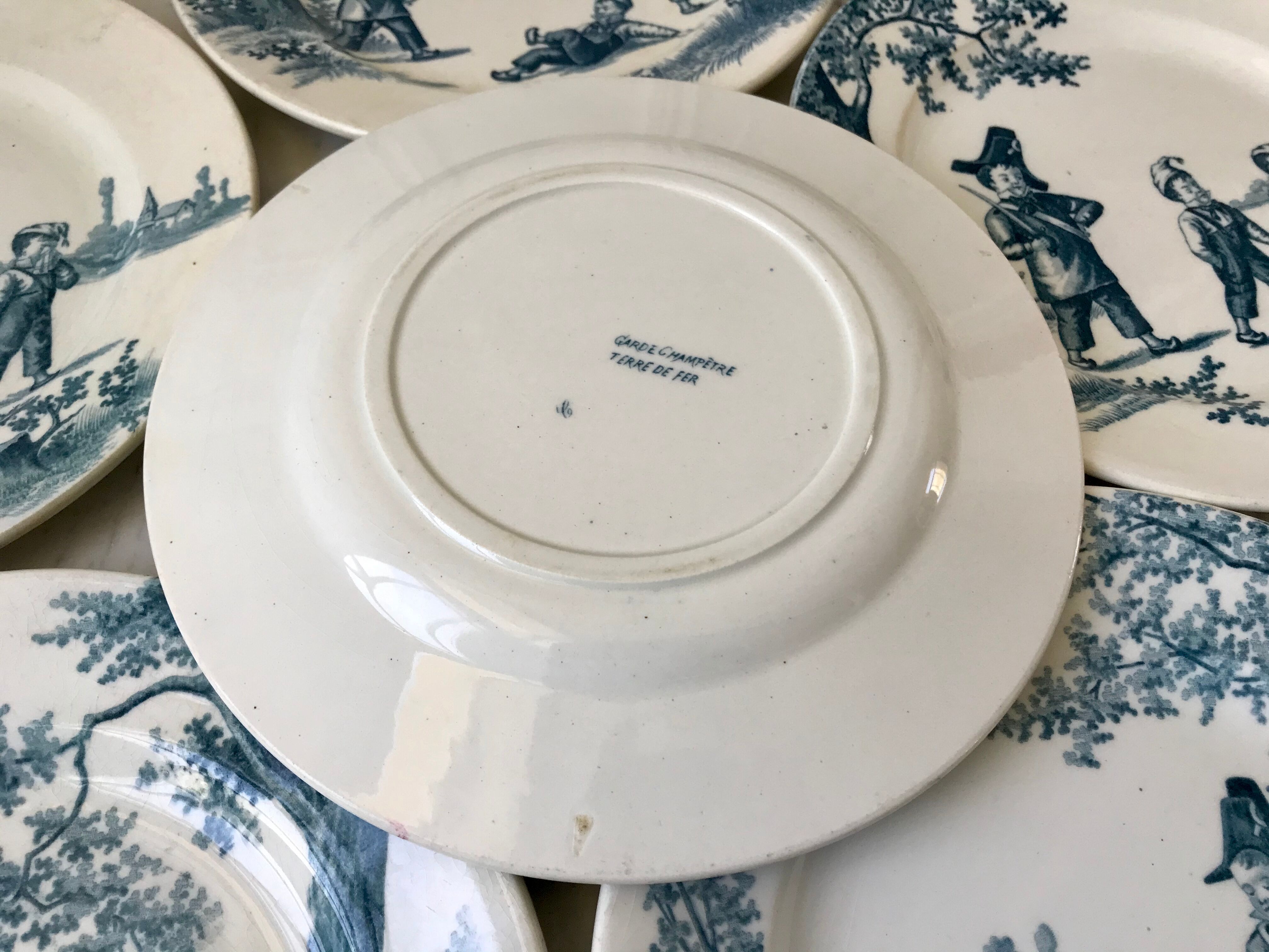 Set of 6 flat plates Iron Earth model "Garde Champêtre" late nineteenth