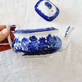 Small porcelain teapot or milk jug with the famous blue willow or weeping pattern