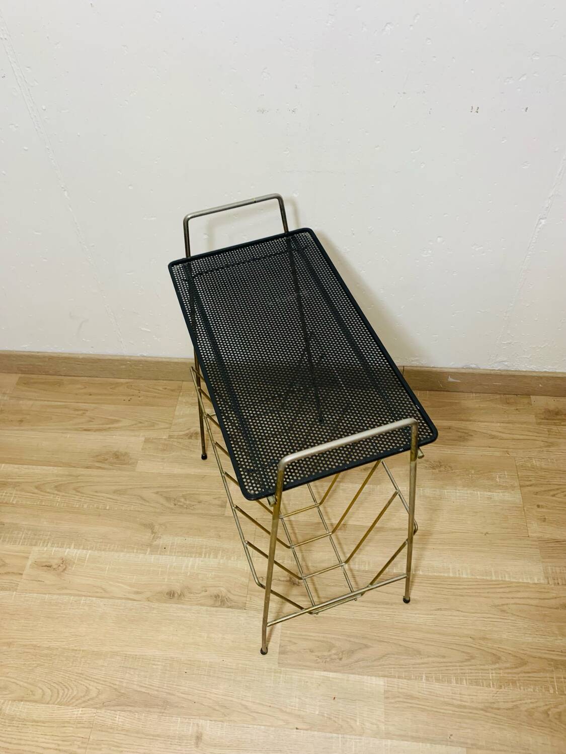 Perforated metal magazine rack