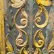 Rectangular Indonesian construction element with blue and yellow plant in carved wood