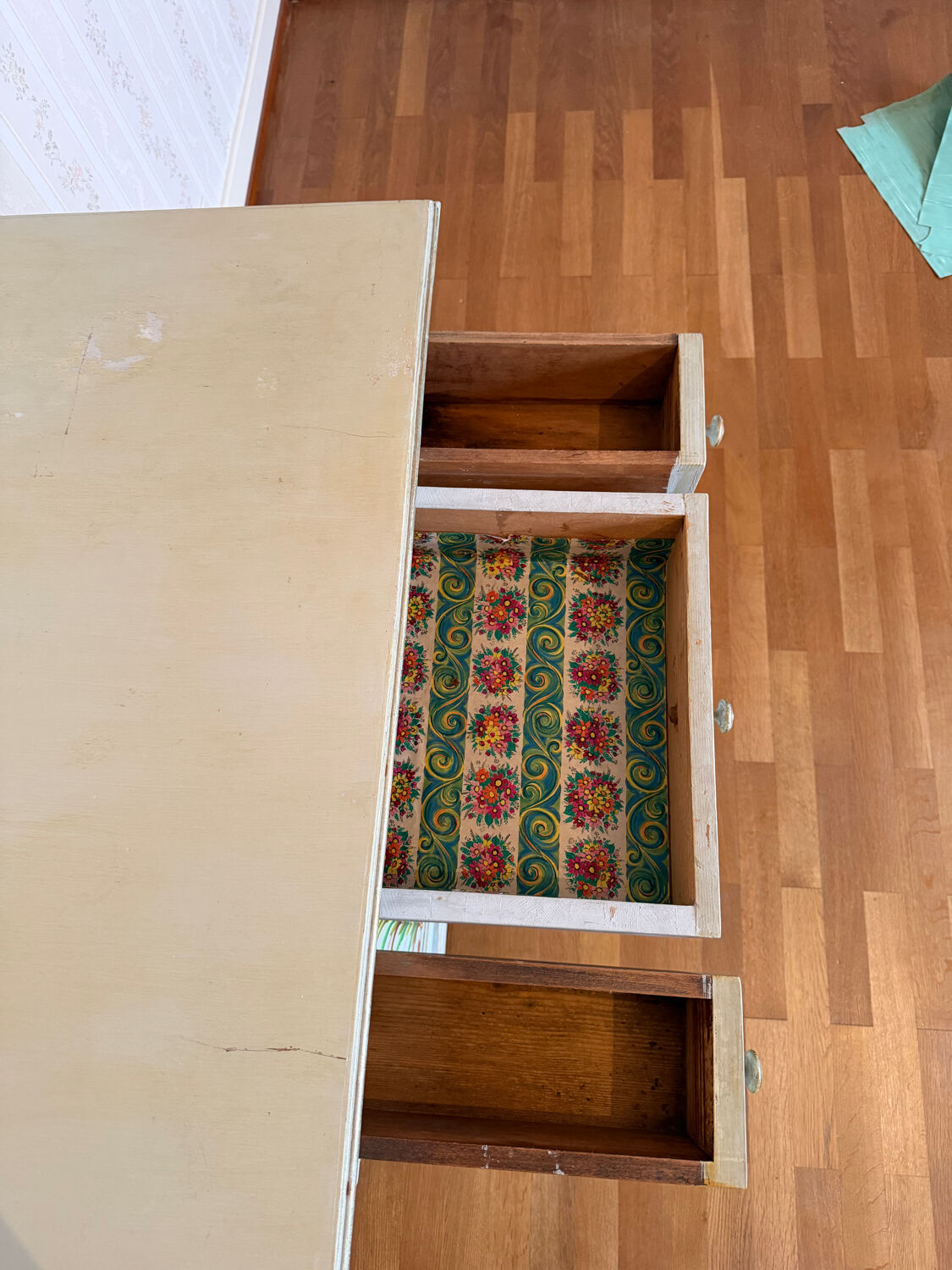 Antique low polychrome sideboard with floral decoration.