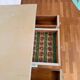 Antique low polychrome sideboard with floral decoration.