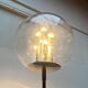 Spherical chrome and glass planetary floor lamp from the mid-century German space age by Doria Leuchten, 1960s.