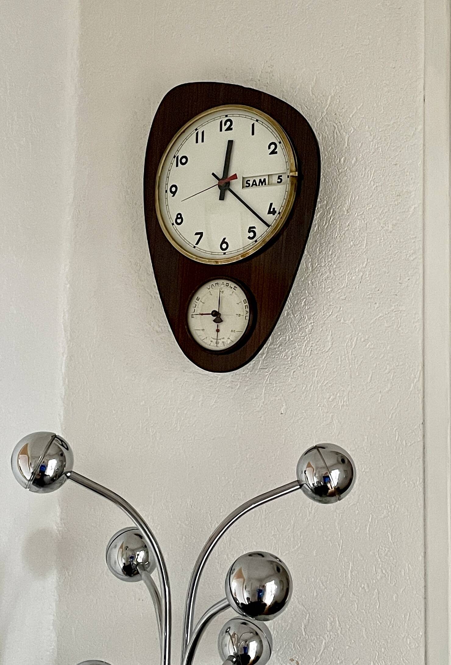 Vintage 1960s wall clock with thermometer and date