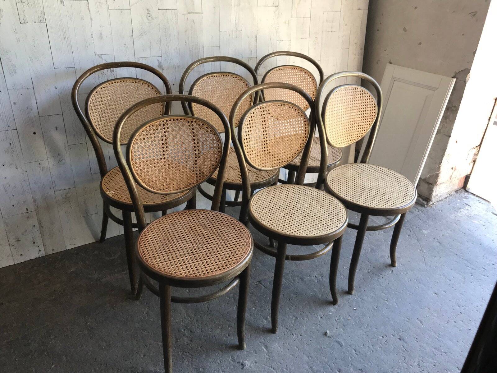 Set of 6 brown bistro chairs in beech with natural cane seat, Germany 1960s.