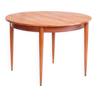Round/oval Scandinavian-style table with extension. Teak wood. France, 60.