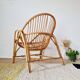 Vintage adult rattan armchair from the 1960s.