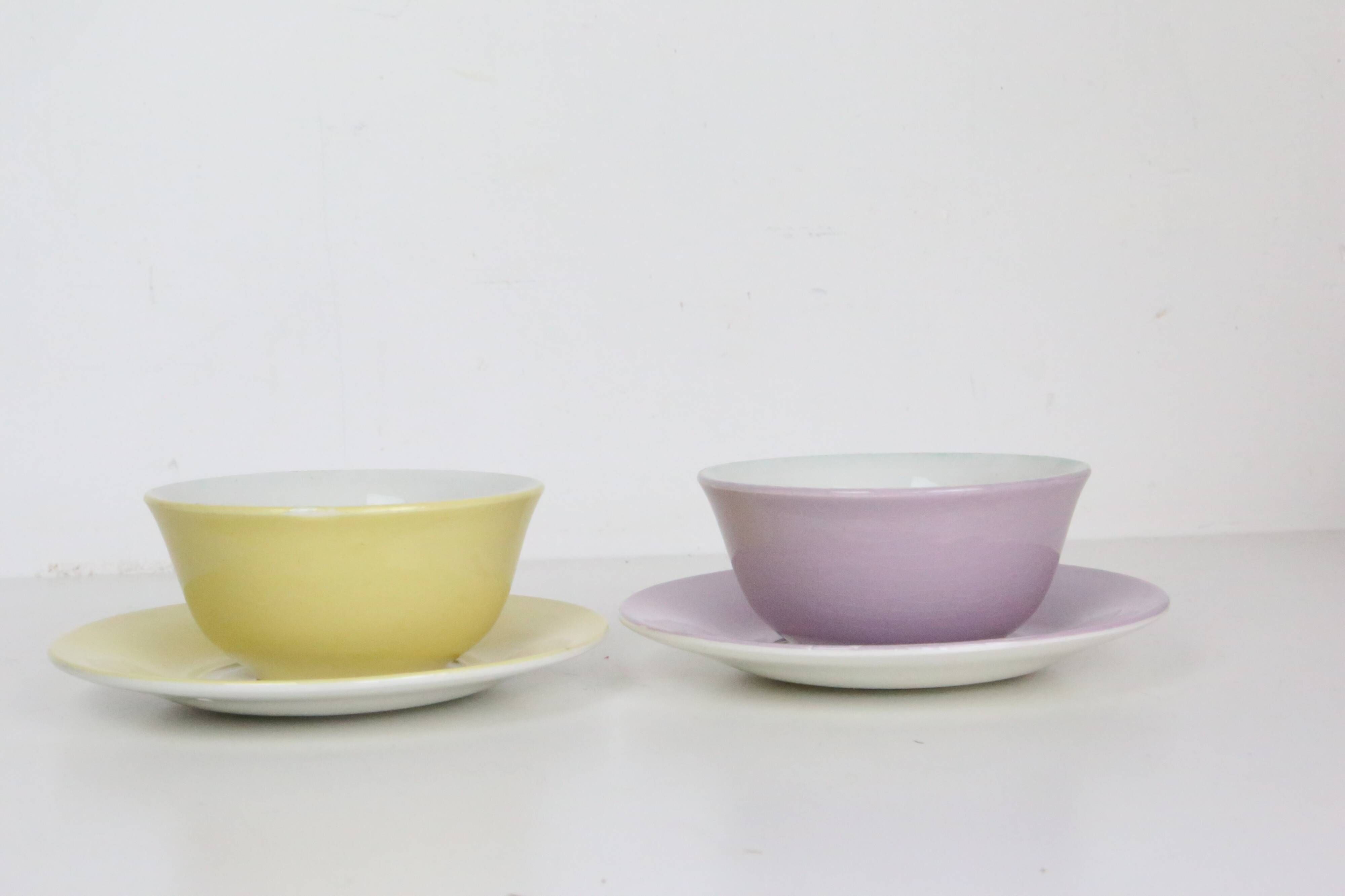Duo of yellow and purple cups + vintage saucers