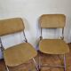 Pair of vintage folding chairs in gilded metal and 70s fabrics, restored