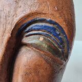 Terracotta face sculpture in African art style