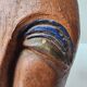 Terracotta face sculpture in African art style