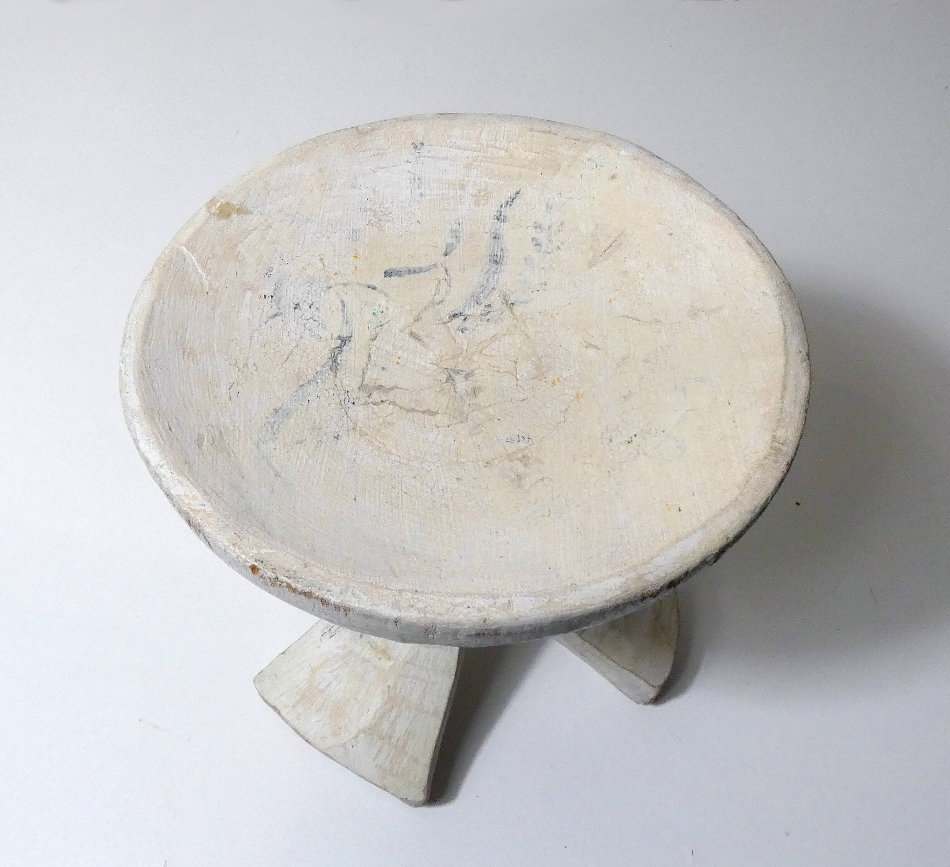 antique small tripod bench/stool in solid carved brutalist wood