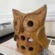 Stoneware lantern in the shape of an owl.