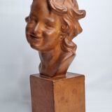 Bust of a laughing child in patinated plaster, 35 cm