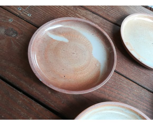 Lot of 4 deep plates made of vintage sandstone