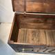 Antique rustic oak chest with original hardware and molded panels