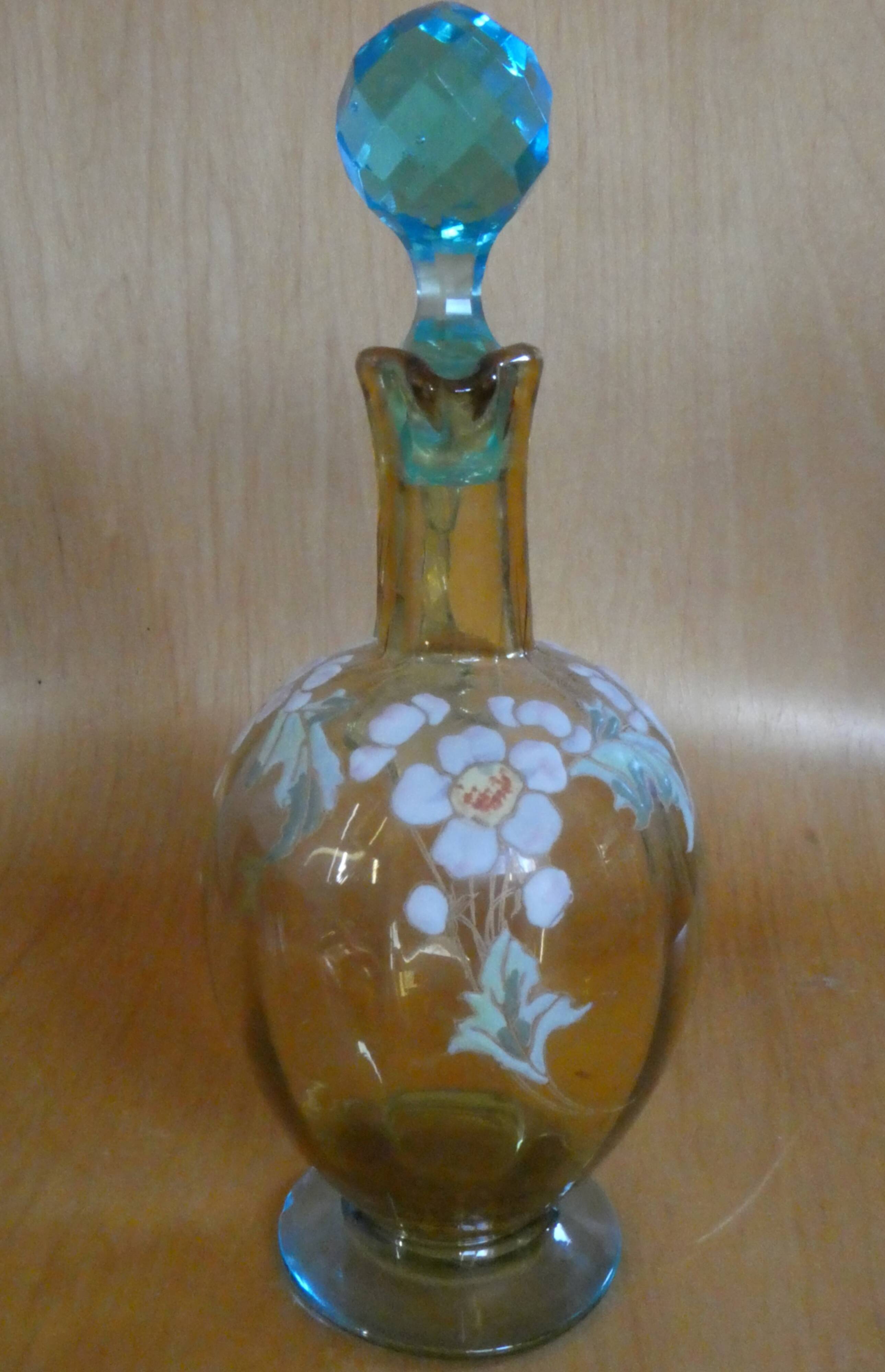 Enamelled liqueur decanter with floral decoration